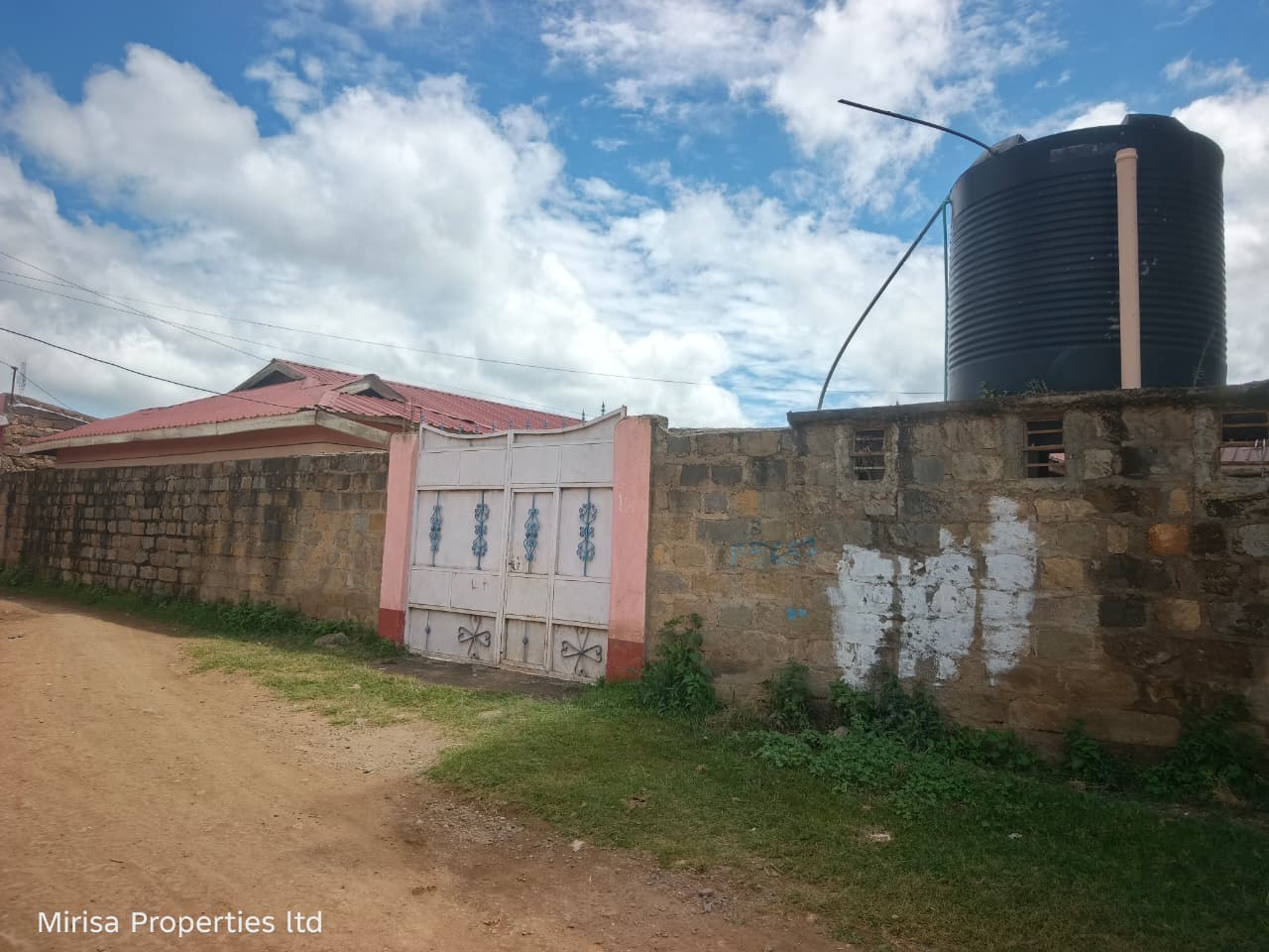 Rental property for sale in Father Ntaiya Estate Narok Town with 4 occupied one-bedroom units